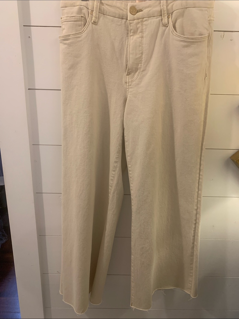 KUT from the Kloth off white wide leg denim jeans.